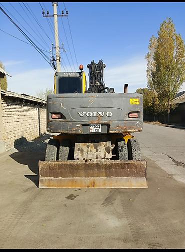 фрезер е26: Экскаватор, Volvo, 2004 г., Колесный — 4