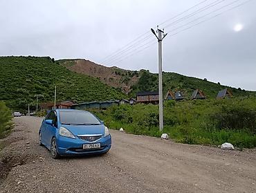 xpeng g3: Honda Fit: 2009 г., 1.5 л, Механика, Бензин, Хэтчбэк — 3