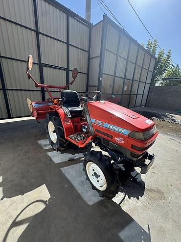 реверс: Мини-трактор Yanmar Ke-3 с почвофрезой 14 л/с - Компактный колесный — 1