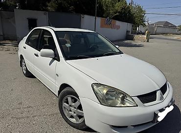 misin: Mitsubishi Lancer: 1.6 l | 2007 il 313000 km Sedan — 7
