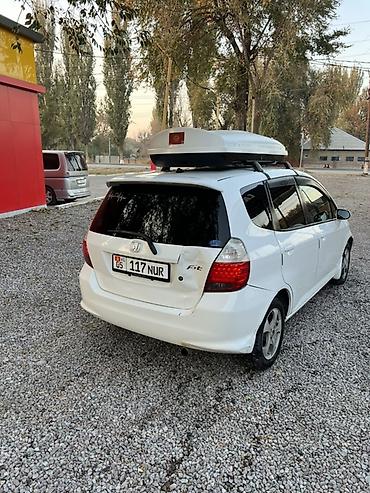 спринтер коротки: Автомобильный бокс на крышу - Жесткий аэродинамический бокс белого — 4