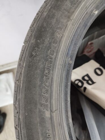 шинный центр ош: Автомобильная шина с размером 235/45R18 94Y. Предназначена для