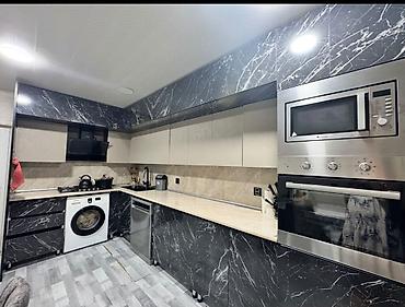Mətbəx mebeli satılır 800₼.Ölçü 5/2. Hündürlüyü 2m. Yeni kimidir,bir