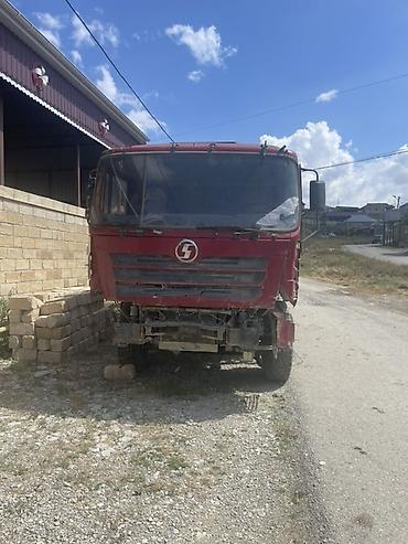 09 maşın: Ağır yük daşıma üçün dump maşını (samossval), 6x4 konfiqurasiyalı — 7
