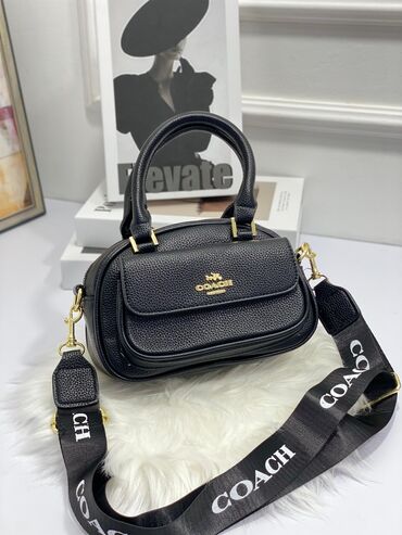 Makasin və loferlər: Çiyin çantası, Məşqçi