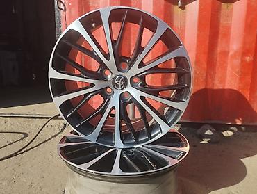 Диски: Литые диски Toyota, комплект из 4 шт. - Диаметр: 18" - Разболтовка — 3