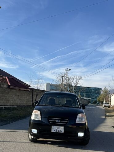 Kia: Kia Picanto EX, qara rəng, 5 qapılı hetçbek. Xüsusiyyətlər: - Kompakt — 1