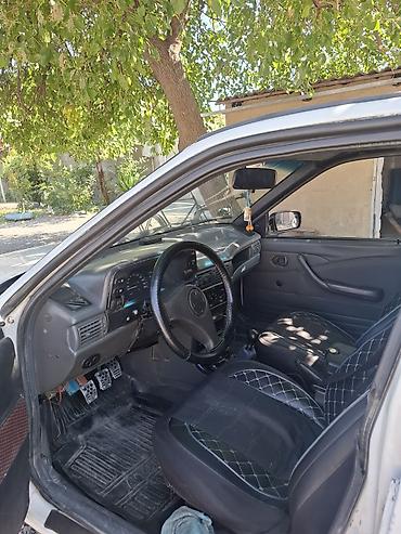 Daewoo: Model: Daewoo Nexia sedan Kuzov: 4 qapılı, ağ rəng Yanacaq: Benzin — 14