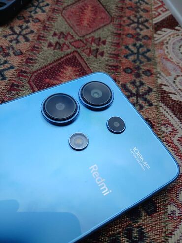 xiaomi mi 9 kontakt home: Xiaomi Redmi Note 13, 256 ГБ, цвет - Синий, 
 Сенсорный, Отпечаток пальца, Беспроводная зарядка