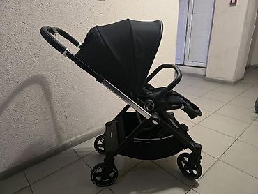 Детская коляска 2-в-1 фирмы ining baby (люлька + прогулочный блок)