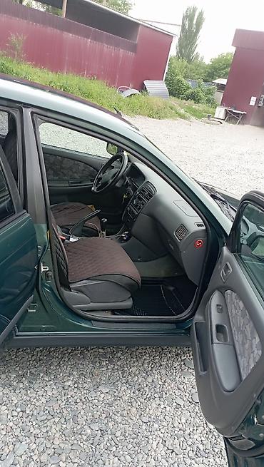 Транспорт: Toyota Avensis: 1997 г., 1.8 л, Механика, Газ, Лифтбек — 5