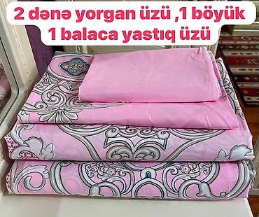 Pastel dəstləri: Yataq dəsti – çəhrayı rəngli Dəst tərkibi: - 2 ədəd yorğan üzü - 1 — 1