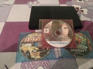 PS2 & PS1 (Sony PlayStation 2 & 1): Продам Пс 2 Слим все есть 3 джойстика 4 игры но диски не читает нужно
