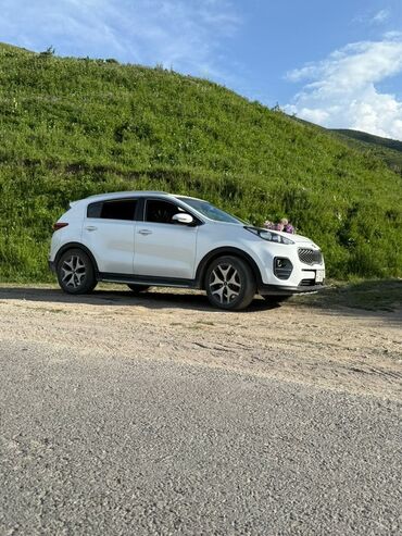 домкрат для авто: Белый кроссовер Kia Sportage – это стильный и функциональный