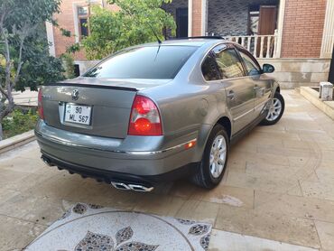 Boşqablar: Volkswagen Passat: 1.8 l | 2004 il Sedan