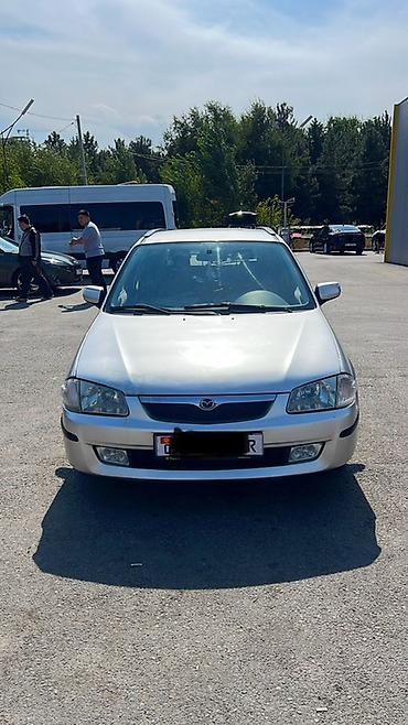 Mazda 323: 1999 г., 1.6 л, Механика, Бензин, Универсал