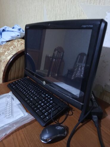 Masaüstü kompüterlər və iş stansiyaları: Acer brendindən bu all-in-one kompüter yığcam dizaynı ilə ev və ya