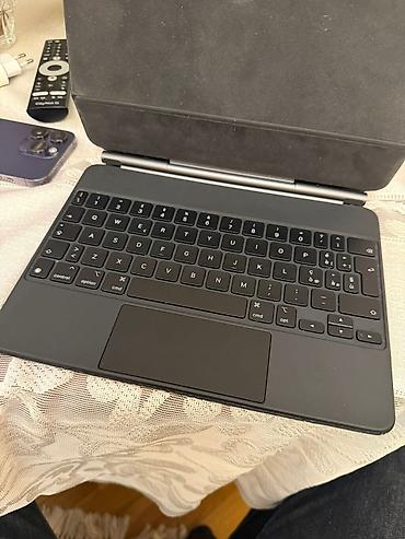 Apple iPad: Apple iPad Pro + Magic Keyboard - Model: iPad Pro (USB‑C/Thunderbolt — 5