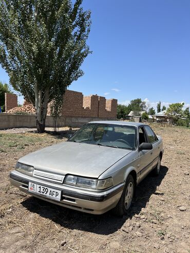 коробка мазда 626: Mazda 626 1991г 
2.2 объем 
Прошу 150 тысяч 
Торг уместен у капота