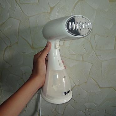 sonifer buxarlı ütü: RAF R.1214W əl tipli buxarlı ütü Xüsusiyyətlər: - Güc: 1500 W - Su — 1