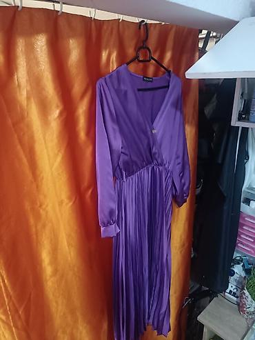 Haljine: Elegantna ljubičasta haljina – New Collection. nema broja. možda — 2
