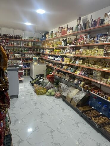 Mağazalar: Şəhərin binə atciliqda mərkəzində yerləşən, tam təchiz olunmuş ərzaq — 2