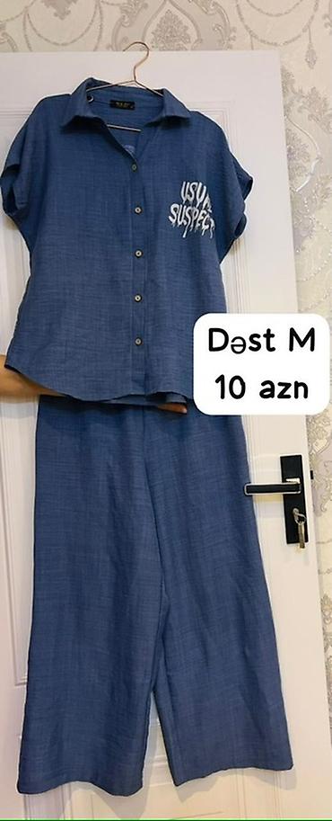 kostum: Qadın geyim dəsti – M ölçü - 2 hissə: qısaqoll düyməli köynək və geniş — 1