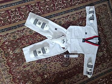 уни формы: Комплект для тхэквондо (WTF/World Taekwondo): Размер на рост 140 уни — 1