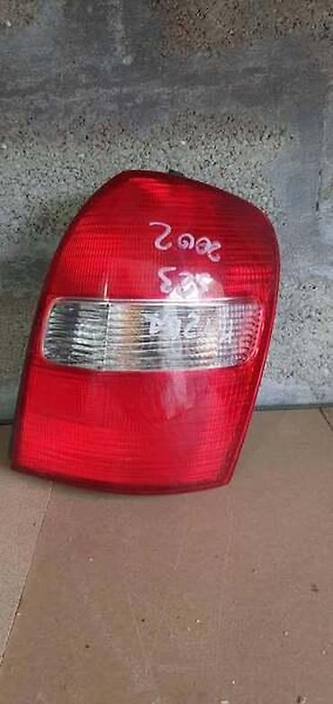 nodi auto: ZADNJE LAMPE STOP SVETLA ZA MAZDA 323 — 1