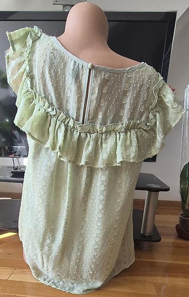 Bluze: Sedam bluzica sa neznatnim tragovima korišćenja. Zelena - M veličina — 2