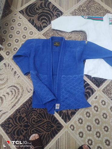 Seat: Məhsul: Judo gi üst geyimi (mavi) Xüsusiyyətlər: - Brend: Mizuno