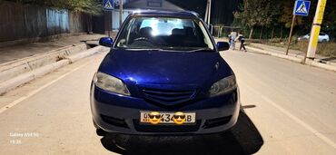 машина 500000: Mazda Demio: 2003 г., 1.5 л, Автомат, Бензин, Седан