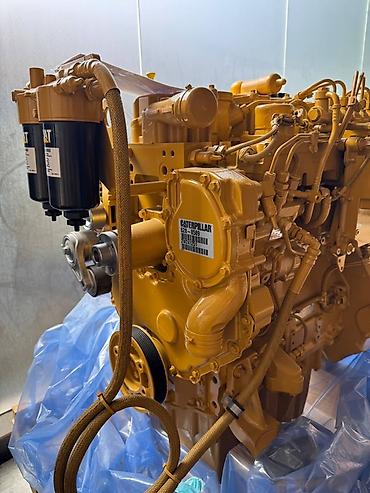 yükləyici traktor: Caterpillar dizel mühərriki – C4.4 sənaye tipli Texniki məlumat: - — 1