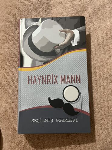 Kişi Geyimləri: Haynrix Mann, Alman yazıçısının əsərləri olan kitab, 2 romanı var