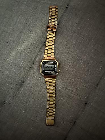 виеда очки: CASIO A168WG — легендарные электронные часы в золотистом исполнении — 1