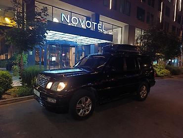 Такси: Минивэн, Пункт назначения: Аэропорт Манас, Количество мест: 7, Лицензия №: 2828 — 4