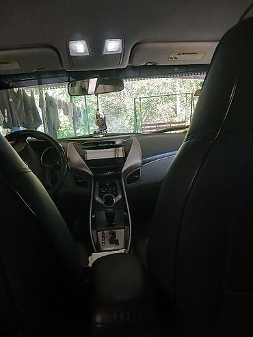 фольксваген пассат 1: Hyundai Elantra: 1.8 л | 2013 г. Седан — 9