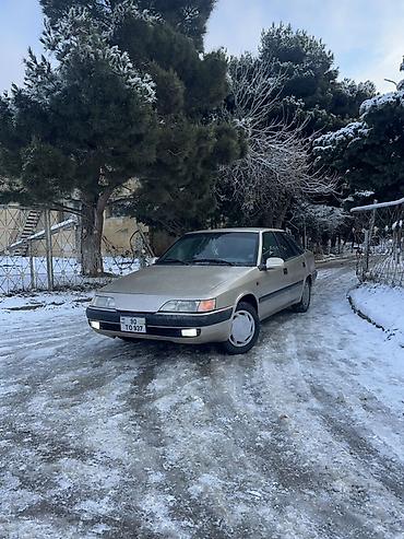 Opel: Model: daevoo Espero Rəng: qızılı/şampan Kuzov: 4 qapı, geniş salon — 11