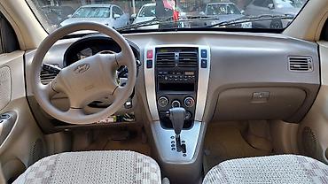 hundai tukson: Hyundai Tucson, qara rəng, 5 qapılı SUV. İli 2006-nın sonu(2007 — 10