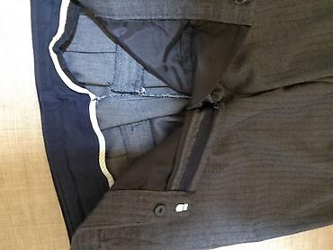 kupaci cacak: Pantalone,velicina 38,dezen riblja kost.Bez ostecenja.Kao nove.Cena — 2
