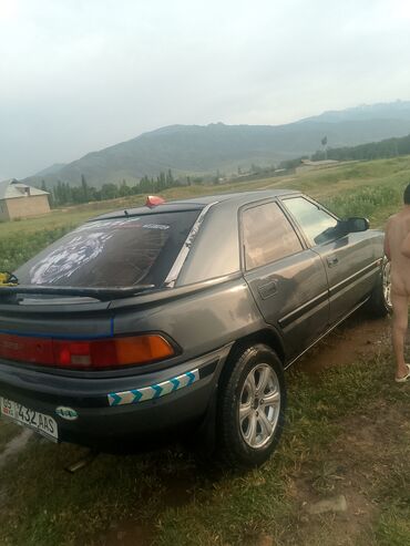 вентилятор гольф: Mazda 323: 1992 г., 1.6 л, Механика, Бензин, Седан
