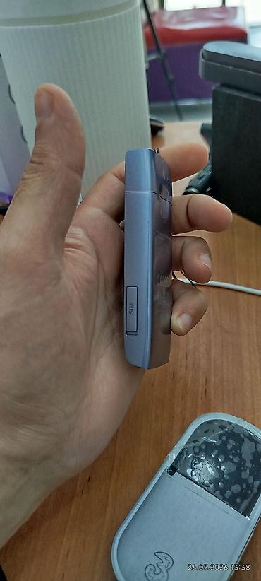 irsad iphone 13 pro: Portativ mobil Wi‑Fi (MiFi) cihazı - Operator loqolu kompakt cib — 1