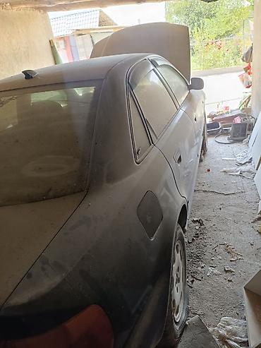 Транспорт: Audi A4: 1996 г., 1.8 л, Механика, Бензин, Седан — 10