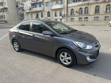 yan güzgü s: Hyundai Accent: 1.4 l | 2012 il Sedan