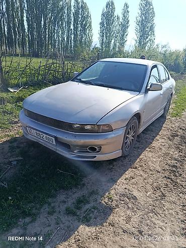 mazda 121 1994: Mitsubishi galant, серебристый цвет, номерной знак 07 882 ABQ — 2