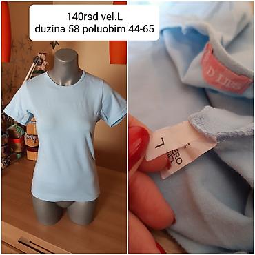 odeca mona: Ženska majica kratkih rukava, svetloplave boje. - Veličina: L - — 1