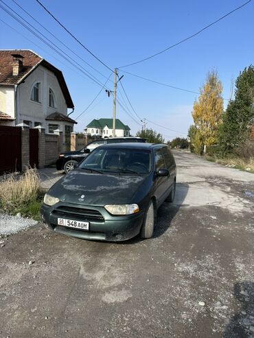 к5 машина бишкек цена: Минивэн зеленого цвета, оснащенный багажными рейлингами на крыше, что