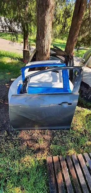 7 stapova: VRATA LEVA ZA OPEL ASTRA J | opel astra j vozaceva vrata — 1
