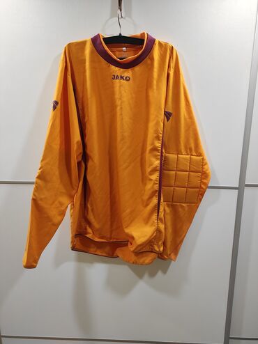 Sportska odeća: Golmanski dres Jako veličina M/L. Polovan iz uvoza. Poluobim grudi 56