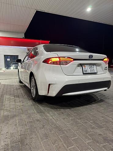 хундай аванте 1: Toyota Corolla: 2021 г., 1.8 л, Автомат, Гибрид, Седан — 3